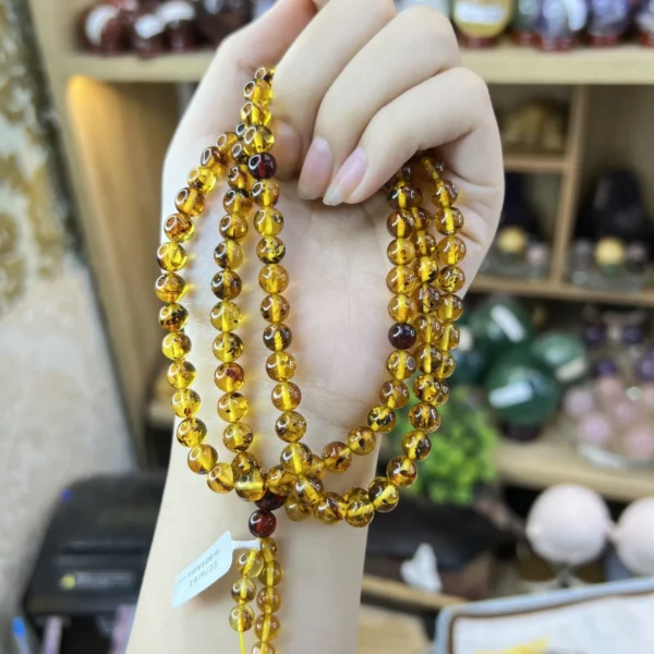 Chuỗi Đeo Tay Hổ Phách Vàng 108 Hạt